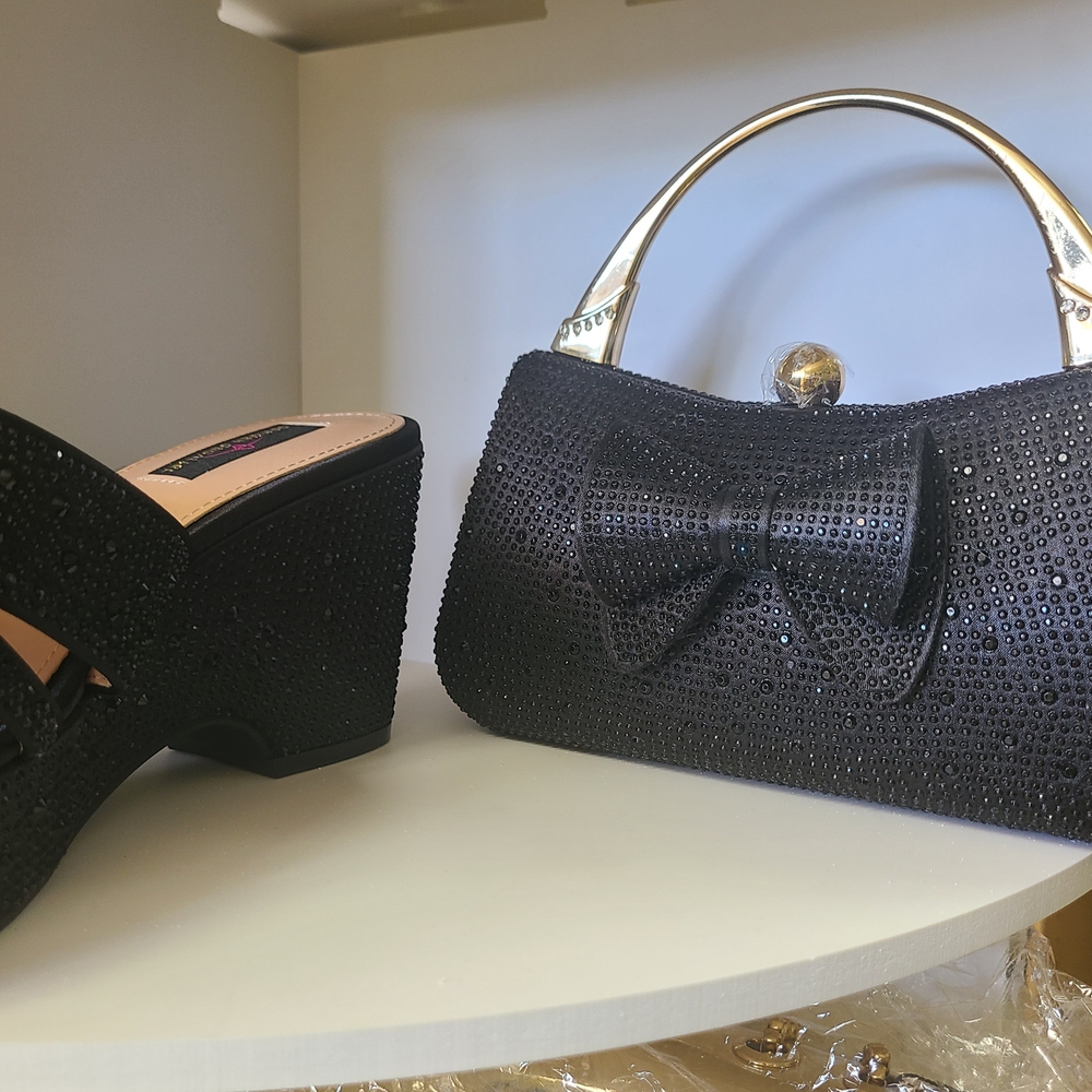 Chic Black Clutch with Bow Accent